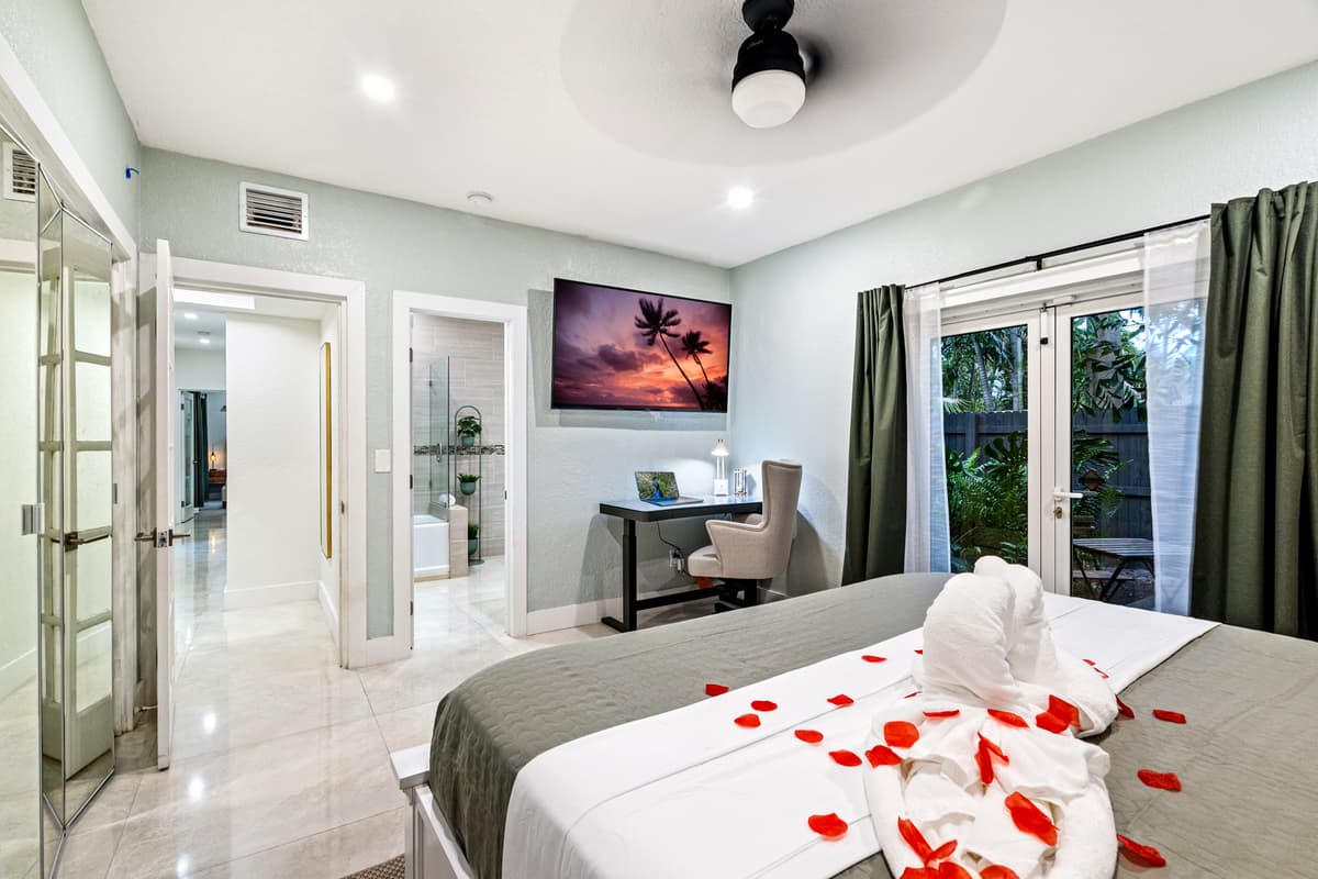 Work if you must, unwind when you’re done — stand-up desk and smart TV in your private suite 💻📺