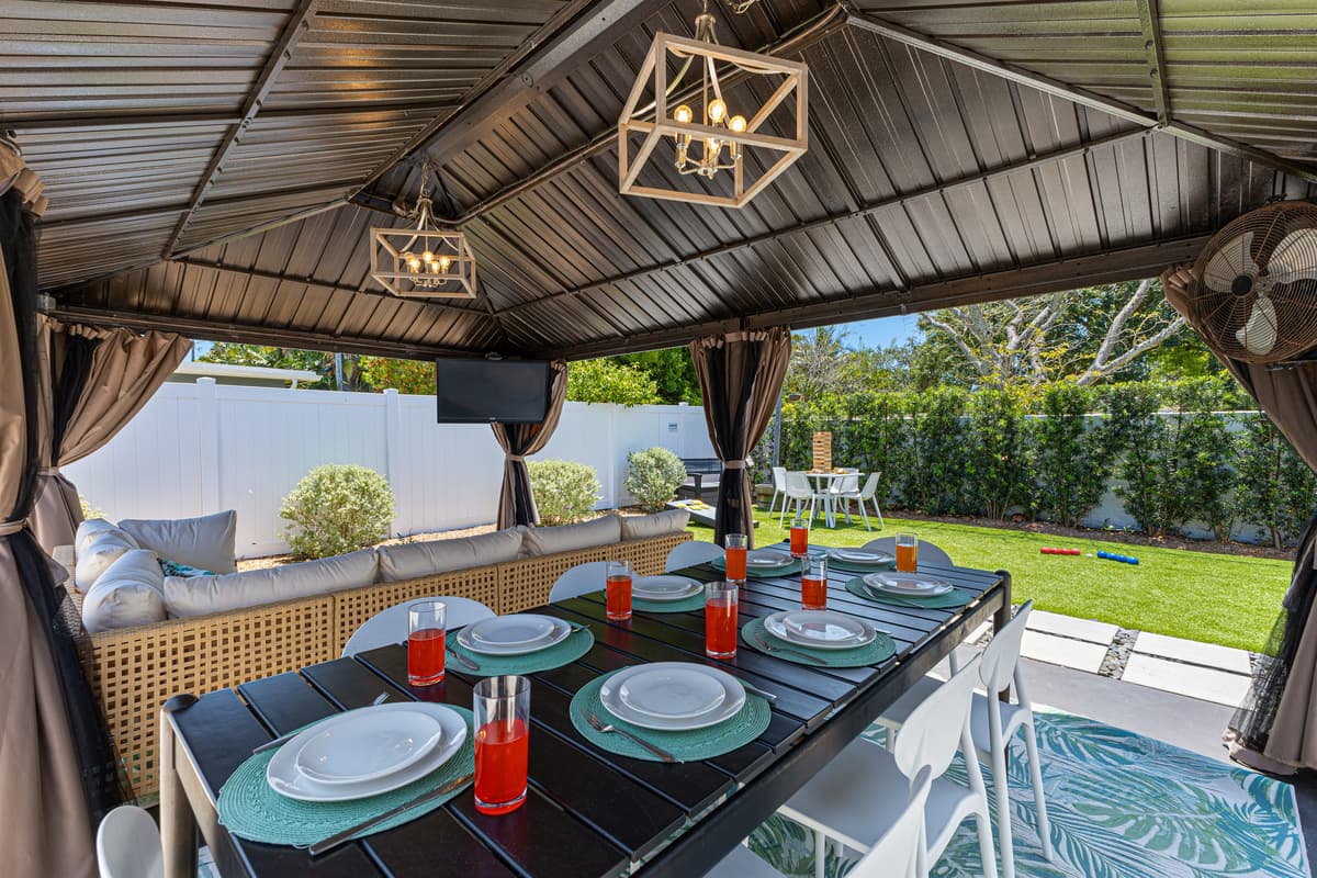 Alfresco dining under the gazebo — gather, laugh, and make memories.