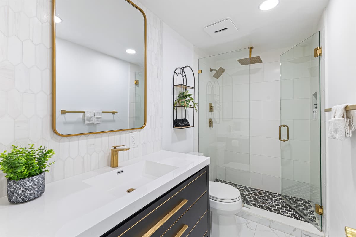 Primary bathroom — bright, clean, and spa-inspired.