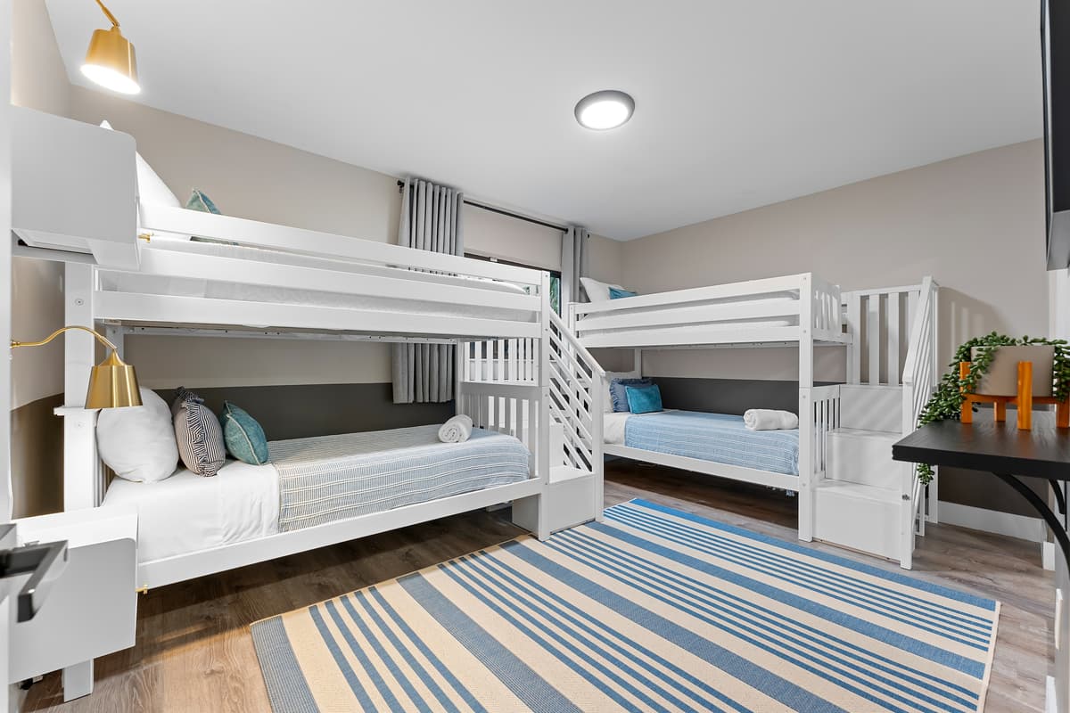 Bunk up! Four cozy twin beds make this room a fun zone for kids or groups.